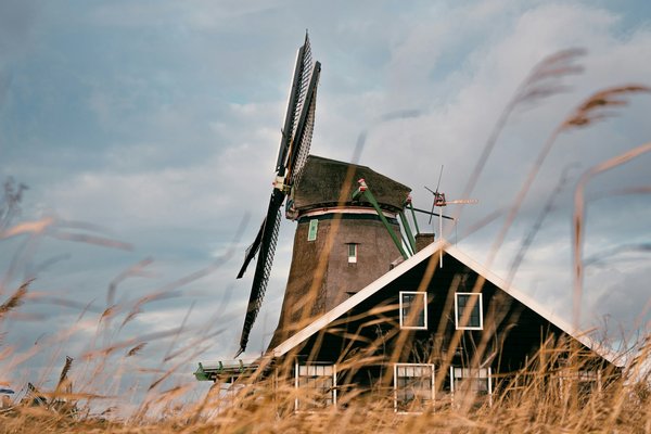 Where can tourists find interactive workshops on the history of British windmills?